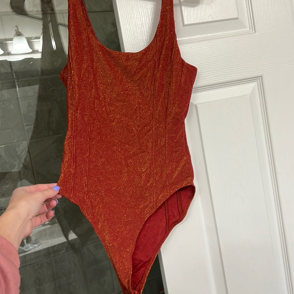 Forever 21 Orange Sparkle bodysuit in size M